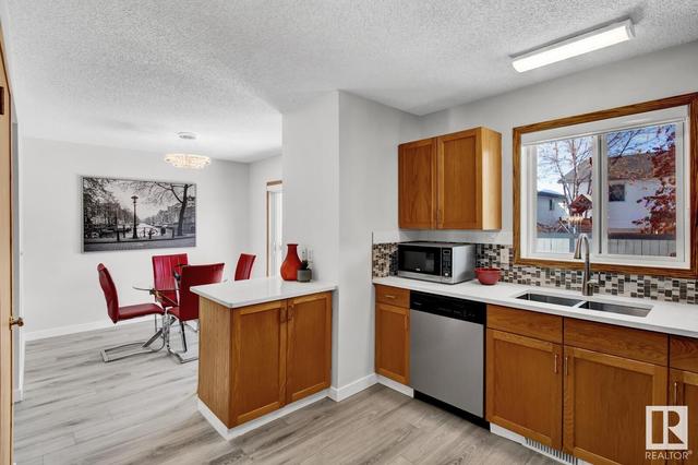 9 - 15 Ritchie Wy, House attached with 4 bedrooms, 2 bathrooms and null parking in Edmonton AB | Image 7