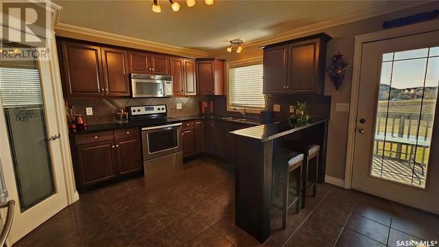 109 - 119 Hampton Circle, House attached with 3 bedrooms, 4 bathrooms and null parking in Saskatoon SK | Image 4