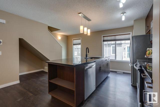 16 - 4050 Savaryn Dr Sw, House attached with 2 bedrooms, 2 bathrooms and null parking in Edmonton AB | Image 15