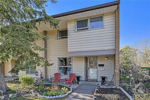 32 Carmichael Court, Townhouse with 4 bedrooms, 2 bathrooms and 2 parking in Ottawa ON | Image 1
