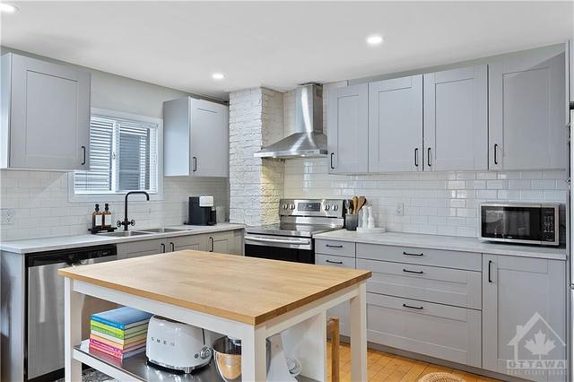 Apt #1 - Open Concept With Updated Kitchen | Image 9
