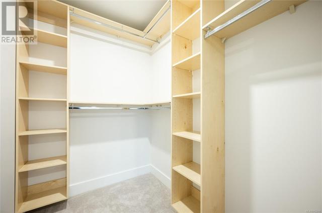 Walk in closet with birch shelving | Image 19