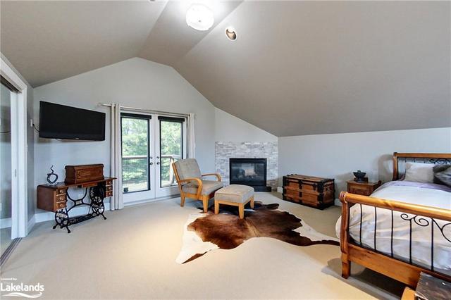 4th Bedroom has a Private Entrance from the Backyard & a Gas Fireplace | Image 20