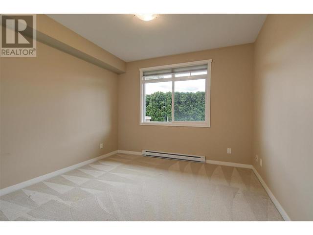 104 - 1350 Ridgeway Dr, Condo with 2 bedrooms, 2 bathrooms and 1 parking in Kelowna BC | Image 24