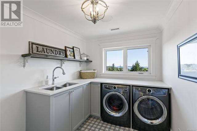 The laundry room has an incredible view | Image 48