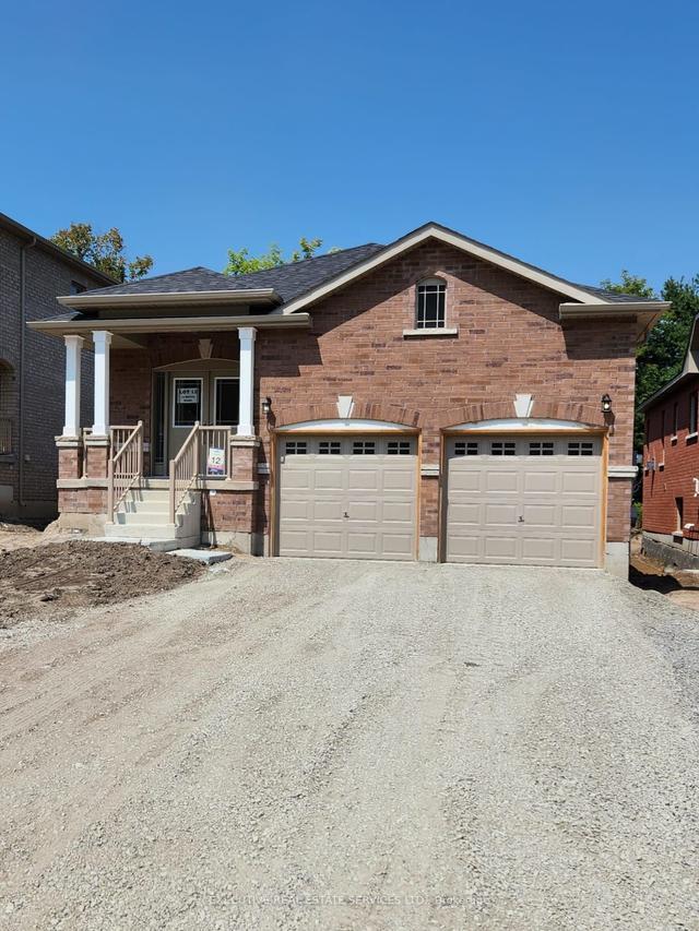 24 Revol Rd, House detached with 3 bedrooms, 2 bathrooms and 6 parking in Penetanguishene ON | Image 1