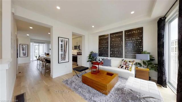 248 Edgevalley Rd, Townhouse with 3 bedrooms, 4 bathrooms and 2 parking in London ON | Image 3