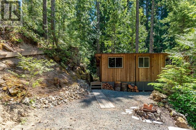 42 Baikie Dr, House detached with 2 bedrooms, 1 bathrooms and 2 parking in Strathcona D (Oyster Bay   Buttle Lake) BC | Image 28