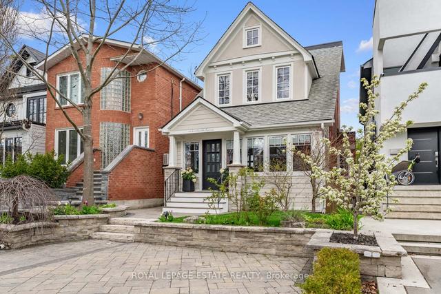 49 Kenilworth Ave, House detached with 4 bedrooms, 3 bathrooms and 2 parking in Toronto ON | Image 1