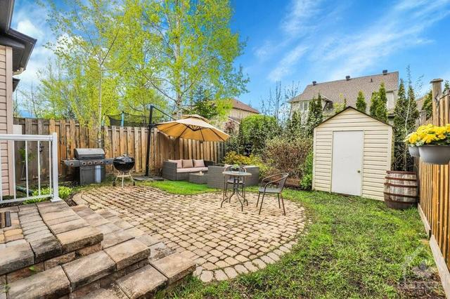 Amazing backyard oasis with interlock Patio for your summer BBQs with a storage shed. | Image 30