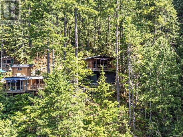 42 Baikie Dr, House detached with 2 bedrooms, 1 bathrooms and 2 parking in Strathcona D (Oyster Bay   Buttle Lake) BC | Image 43