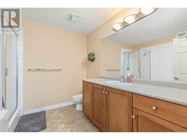 106 - 1961 Durnin Rd, Condo with 2 bedrooms, 2 bathrooms and 1 parking in Kelowna BC | Image 23