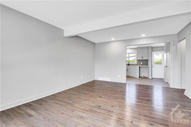 Gorgeous Brand New high quality renovation. Everything is brand new. New KItchen with quartz counters, new cabinets, new hardwood floors and cermic tile floors. Flat ceilings! New lighting, new do | Image 6