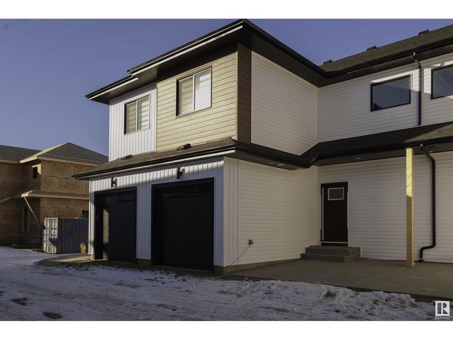 61 - 130 Hawks Ridge Bv Nw, House attached with 4 bedrooms, 3 bathrooms and null parking in Edmonton AB | Image 2