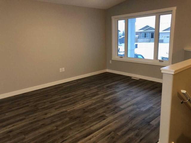 321 East 250 North, House detached with 3 bedrooms, 3 bathrooms and 2 parking in Raymond AB | Image 9