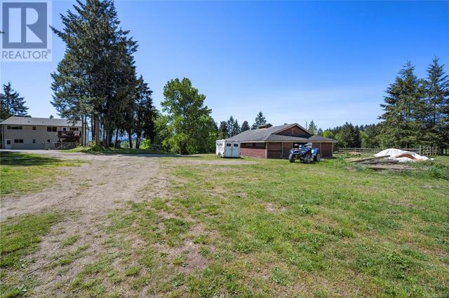 2120 Huddington Rd, House detached with 4 bedrooms, 2 bathrooms and 10 parking in Nanaimo A BC | Image 49