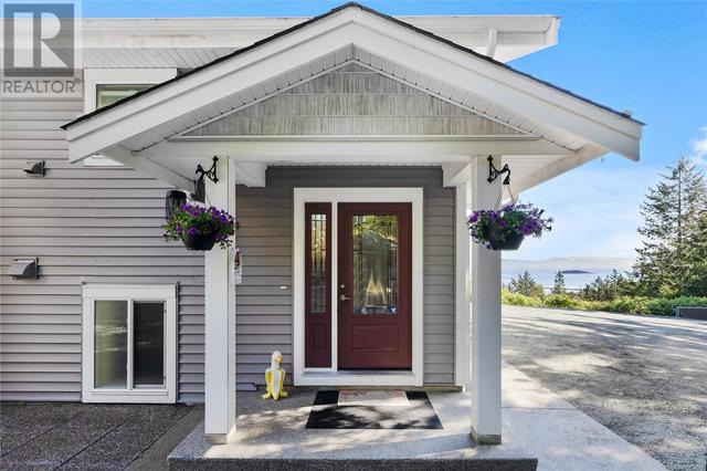8475 Lisa Lane, House detached with 4 bedrooms, 3 bathrooms and 8 parking in Lantzville BC | Image 14