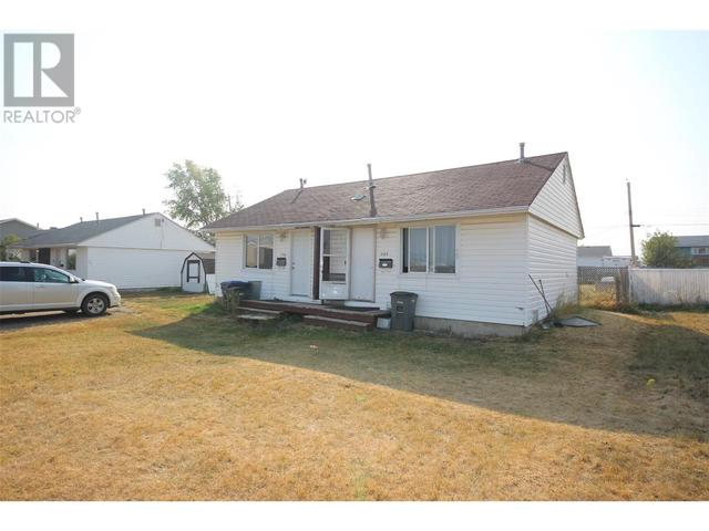 1125 116 Ave, House semidetached with 2 bedrooms, 2 bathrooms and null parking in Dawson Creek BC | Image 1
