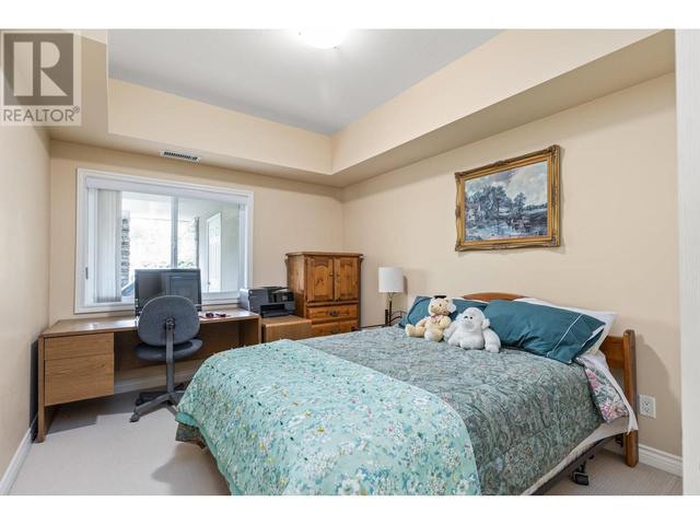 106 - 1961 Durnin Rd, Condo with 2 bedrooms, 2 bathrooms and 1 parking in Kelowna BC | Image 18