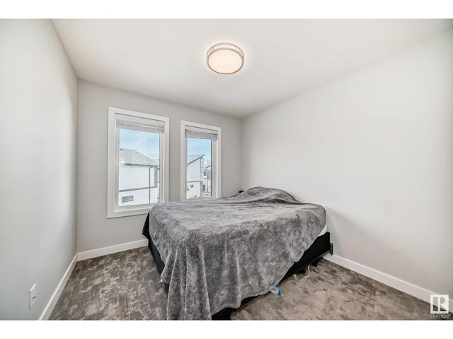 1121 Keswick Dr Sw Sw, House attached with 2 bedrooms, 2 bathrooms and null parking in Edmonton AB | Image 23