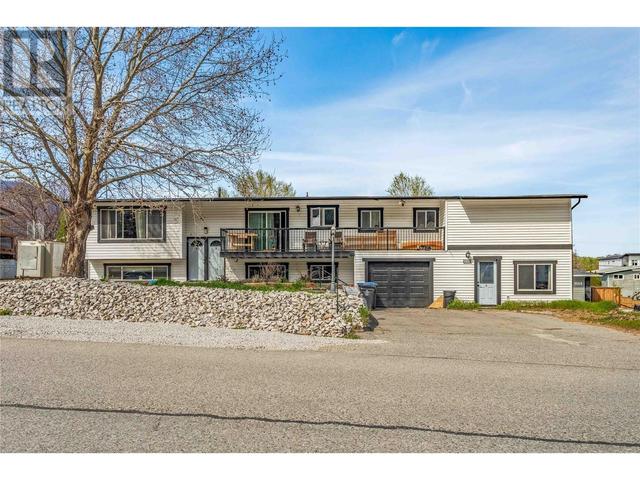 1560 Ponderosa Rd, House detached with 7 bedrooms, 3 bathrooms and 5 parking in West Kelowna BC | Image 1