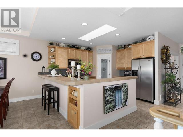 12 - 7760 Okanagan Landing Rd, House detached with 4 bedrooms, 3 bathrooms and 2 parking in Vernon BC | Image 11