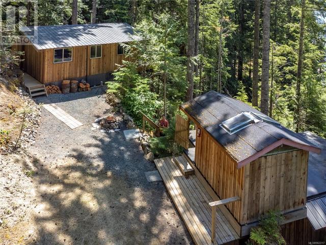 42 Baikie Dr, House detached with 2 bedrooms, 1 bathrooms and 2 parking in Strathcona D (Oyster Bay   Buttle Lake) BC | Image 61