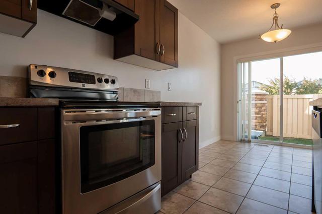 1 - 213 Silkstone Rd W, Home with 3 bedrooms, 2 bathrooms and 2 parking in Lethbridge AB | Image 10
