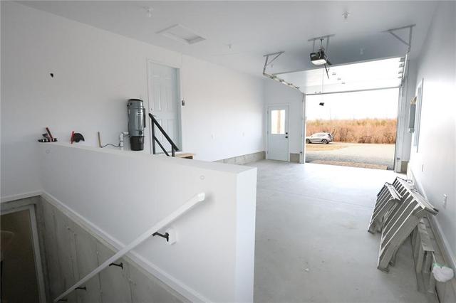 Garage Entry to Basement | Image 25