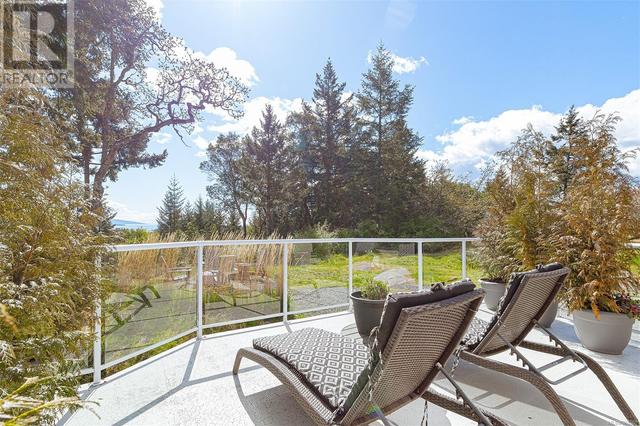8518 Tribune Terr, House detached with 5 bedrooms, 3 bathrooms and 4 parking in North Saanich BC | Image 55
