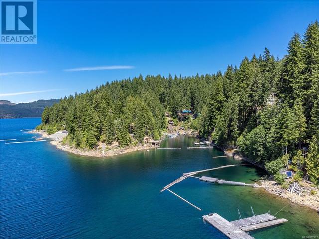 42 Baikie Dr, House detached with 2 bedrooms, 1 bathrooms and 2 parking in Strathcona D (Oyster Bay   Buttle Lake) BC | Image 46