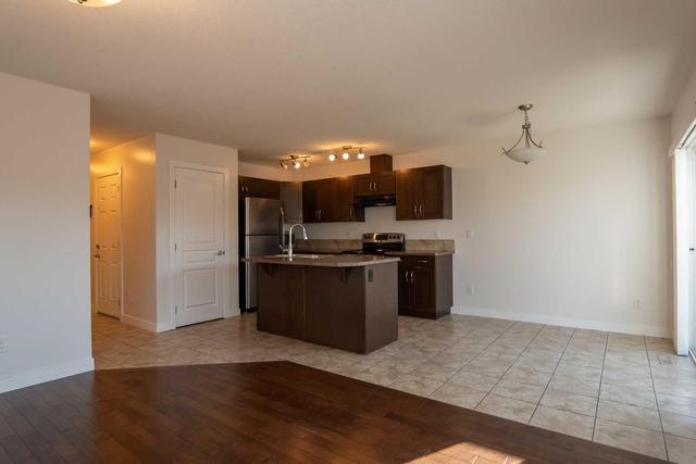 1 - 213 Silkstone Rd W, Home with 3 bedrooms, 2 bathrooms and 2 parking in Lethbridge AB | Image 4
