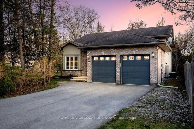 18 Westbury Rd, House detached with 3 bedrooms, 3 bathrooms and 6 parking in Wasaga Beach ON | Image 1