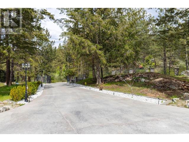 5774 Deadpine Dr, House detached with 6 bedrooms, 5 bathrooms and 3 parking in Central Okanagan BC | Image 51