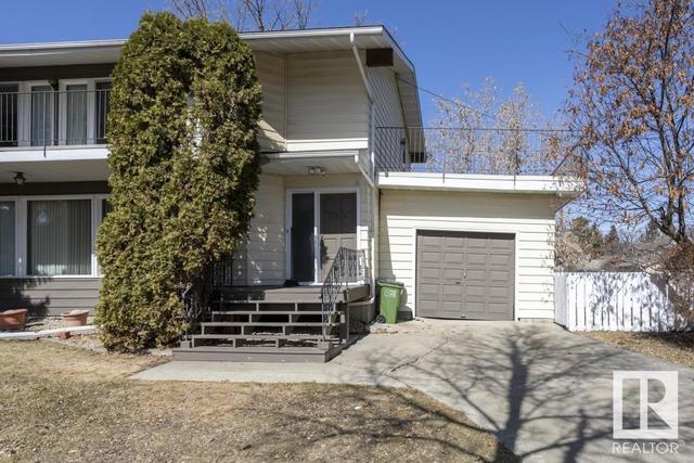 12214 108 Ave Nw, House semidetached with 4 bedrooms, 2 bathrooms and 2 parking in Edmonton AB | Image 1
