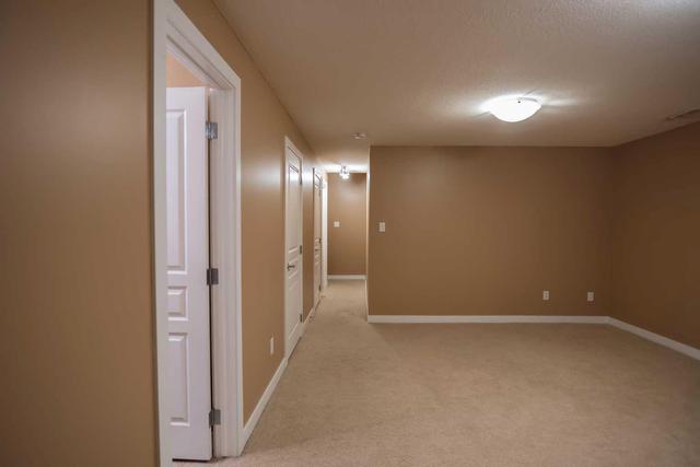 1 - 213 Silkstone Rd W, Home with 3 bedrooms, 2 bathrooms and 2 parking in Lethbridge AB | Image 24
