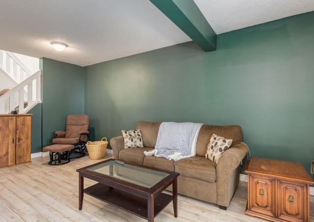 124 - 3219 56 St Ne, Home with 3 bedrooms, 1 bathrooms and 2 parking in Calgary AB | Image 7