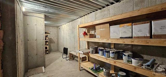 Under the big front porch is this great cold storage room, the possibilities are endless. | Image 23