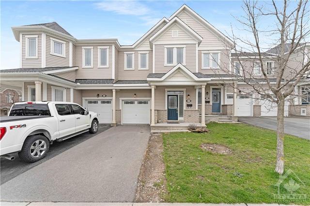 424 Meadowbreeze Drive, Townhouse with 3 bedrooms, 3 bathrooms and 3 parking in Ottawa ON | Image 1