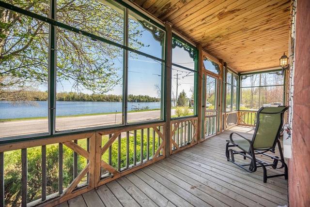 Screened porch with a view. | Image 8