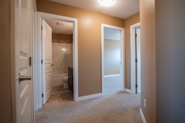 1 - 213 Silkstone Rd W, Home with 3 bedrooms, 2 bathrooms and 2 parking in Lethbridge AB | Image 16