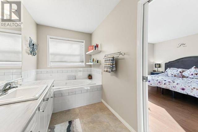 159 - 609 Truswell Rd, House attached with 2 bedrooms, 2 bathrooms and 4 parking in Kelowna BC | Image 23