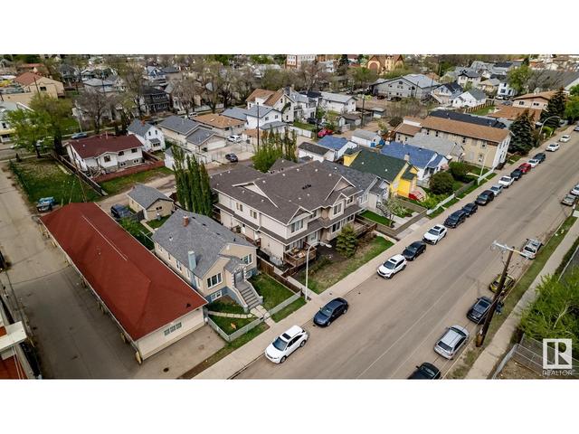 9648 106 Ave Nw, House attached with 4 bedrooms, 2 bathrooms and null parking in Edmonton AB | Image 4