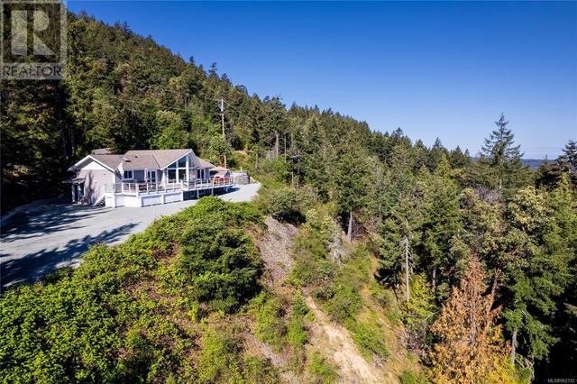 8475 Lisa Lane, House detached with 4 bedrooms, 3 bathrooms and 8 parking in Lantzville BC | Image 79