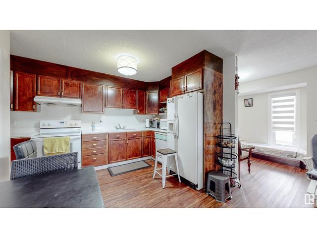 1252 48 St Nw, House attached with 2 bedrooms, 2 bathrooms and null parking in Edmonton AB | Image 10
