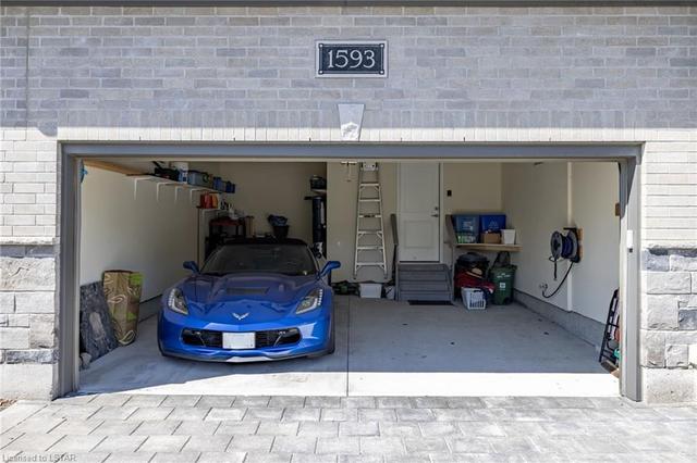 double garage with room for golf cart | Image 29