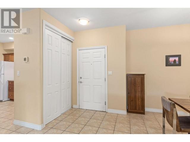 106 - 1961 Durnin Rd, Condo with 2 bedrooms, 2 bathrooms and 1 parking in Kelowna BC | Image 2