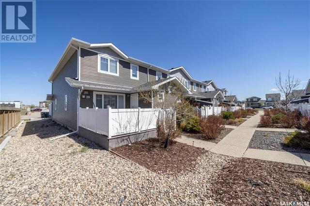 3467 Elgaard Dr, House attached with 2 bedrooms, 2 bathrooms and null parking in Regina SK | Image 1