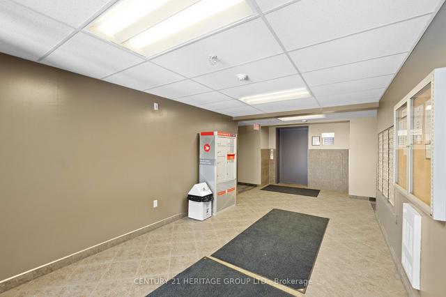 402 - 45 Kingsbury Sq, Condo with 2 bedrooms, 1 bathrooms and 1 parking in Guelph ON | Image 11
