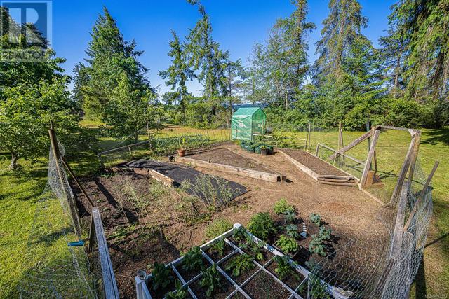 505 Arbutus Bay Rd, House detached with 3 bedrooms, 2 bathrooms and 8 parking in Comox Valley A BC | Image 21